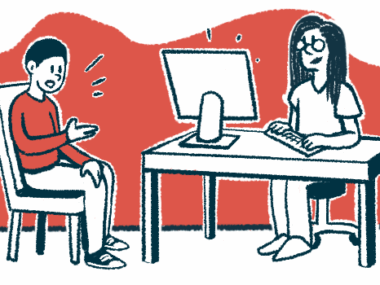 A patient speaks to a clinician who is entering data on a computer.