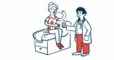 A patient sits on an exam table and takes a pill while a doctor looks on.